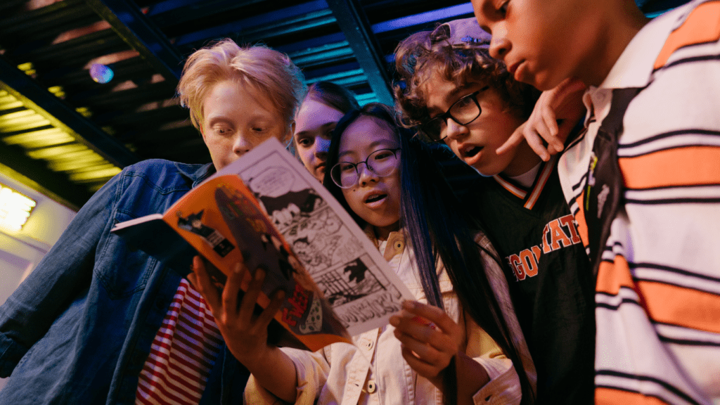 kids reading a comic book